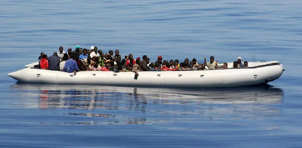 A rigid inflatable boat carrying migrants at sea near the Italian island of Lampedusa.
